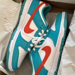 Nike Teal and White Sneakers with Red Accents
